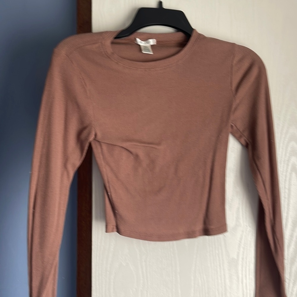 Small tight long sleeve shirt new never worn